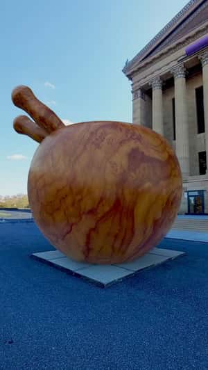 Giant Sculpture in Front of Museum in a fake-out-of-home ad of Lilly Fine Craft