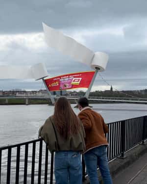 Giant Toilet Rolls on Bridge in a fake-out-of-home ad of SPAR