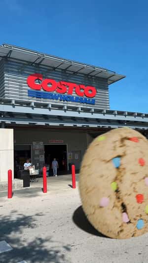 Giant Cookies Roll Outside Costco in a fake-out-of-home ad of Partake Foods