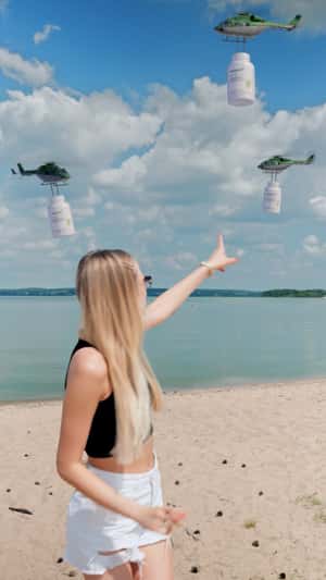 Helicopters Carry Giant Bottles in a fake-out-of-home ad of Herbalife TV