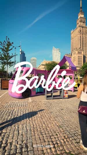 Life-Size Barbie Dream Camper in City in a fake-out-of-home ad of Mattel