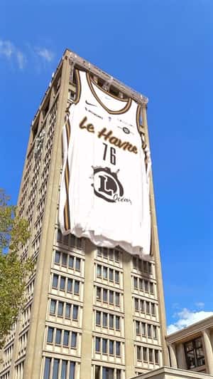 Giant Jersey Unfolds on Hotel Facade in a fake-out-of-home ad of Stb Le Havre