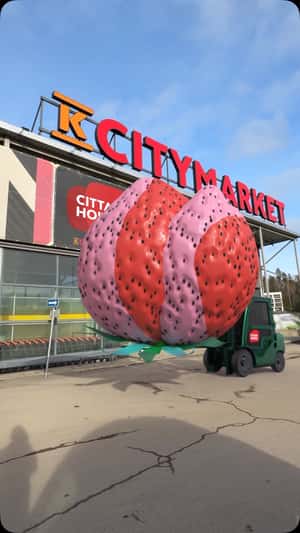 Forklift Transports Giant Strawberry in a fake-out-of-home ad of K-Citymarket