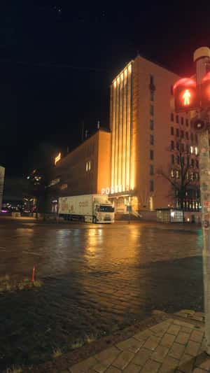 Christmas Truck Takes Flight at Night in a fake-out-of-home ad of Posti