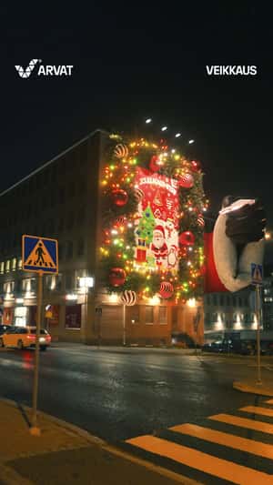 Giant Christmas Card Gets Scratched in a fake-out-of-home ad of Veikkaus
