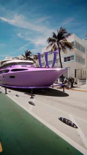 Purple Boat Parked on Street in a fake-out-of-home ad of Windsor