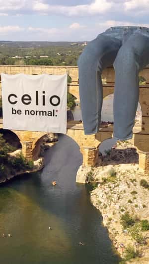Giant Jeans Sit on Pont du Gard in a fake-out-of-home ad of Celio