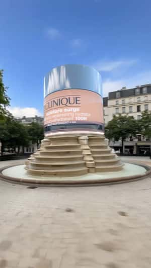 Giant Jar Opens on Monument Pedestal in a fake-out-of-home ad of Clinique