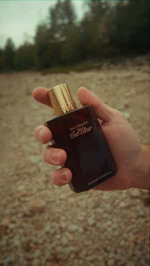 Man Battles Dragon in a fake-out-of-home ad of Davidoff Parfums