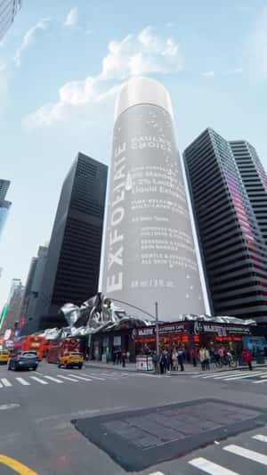 Building Reveals Giant Bottle in a fake-out-of-home ad of Cloud 10 Beauty