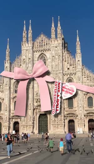 Giant Ribbon Wraps Duomo di Milano in a fake-out-of-home ad of Desigual