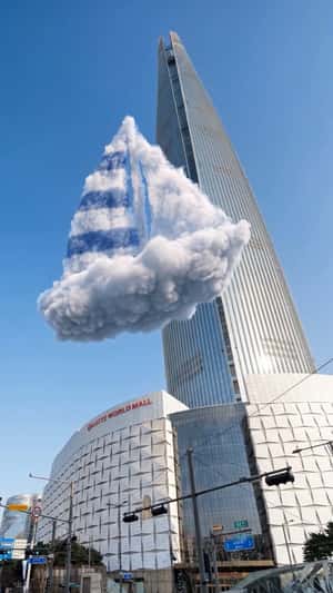 Cloud Sailboat Floats Across Seoul in a fake-out-of-home ad of Eyesmag