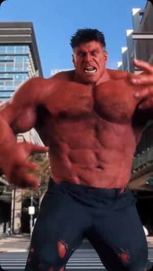 Red Hulk Cracks Screen With Giant Clap in a fake-out-of-home ad of Marvel