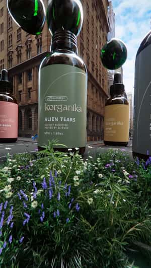 Giant Droplets Make Grass Grow on Streets in a fake-out-of-home ad of Korganika