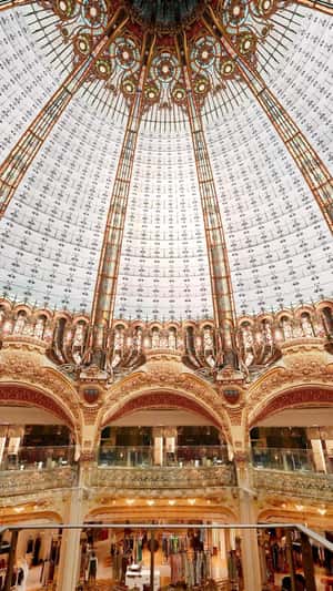 Lip Balm Flips in Glass Dome in fake-out-of-home ad of Prada Beauty