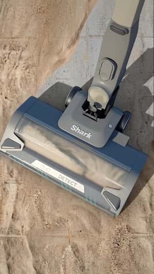 Giant Shark Vacuum Cleans Beach Promenade in a fake-out-of-home ad of Amazon