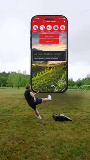Giant Phone on Soccer Field in a fake-out-of-home ad of Turkish Airlines