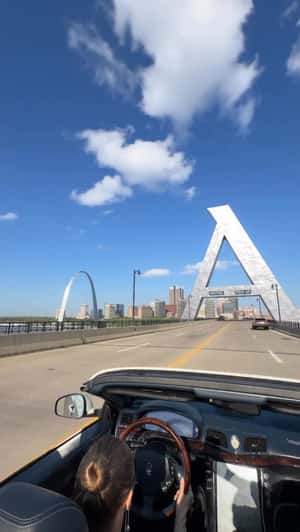 Giant Letter A Towers Over Gateway Arch in a fake-out-of-home ad of Aritzia