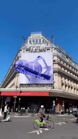 Purple Shoe Flying in fake-out-of-home ad of Galeries Lafayette