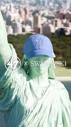 Giant Yankees Caps Float Over New York in a fake-out-of-home ad of Swarovski