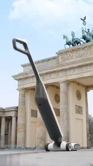 White Vacuum Sweeping in fake-out-of-home ad of Roborock