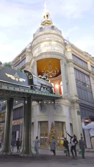 Steam Locomotive Gifts Paris in Fake-out-of-home ad of Printemps Haussmann