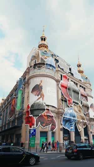 Stickers Covering the Façade in a Fake-out-of-home ad of Printemps