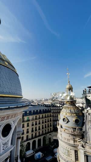 Papers  Float Around the Tower in Fake-out-of-home ad of Printemps