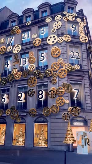 Floating Golden Pendants in a fake-out-of-home ad of Rabanne