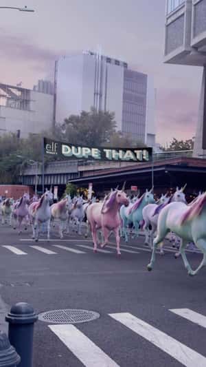 Colorful Unicorn Parade in fake-out-of-home ad of e.l.f. Cosmetics
