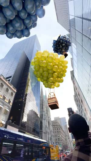 Grapes Hot Air Balloons in a fake-out-of-home ad of Moët Hennessy