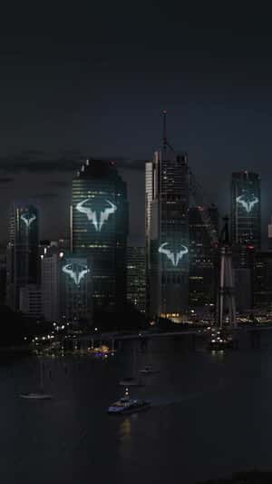 Rafael Nadal logo illuminated in skyscrapers fake-out-of-home ad of Nike