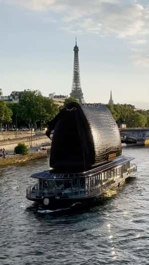 Black Bag On River Cruise in fake-out-of-home ad of Victoria Beckham