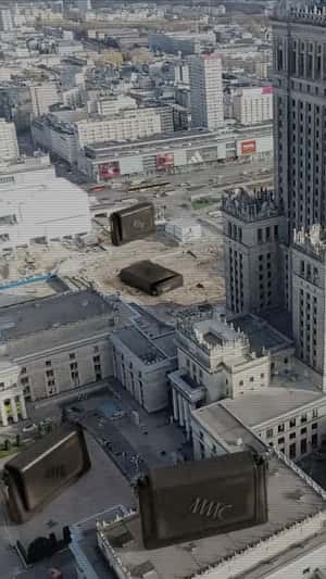 Black Handbags Glide Over City in fake-out-of-home ad of MMC