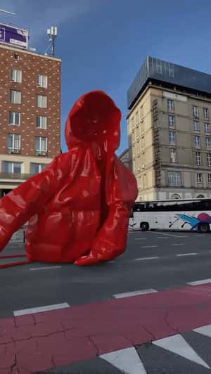 Red Jacket Floats Through the City in fake-out-of-home ad of MMC