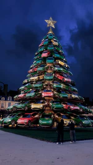 Stacked Cars Christmas Tree in fake-out-of-home ad of Porsche