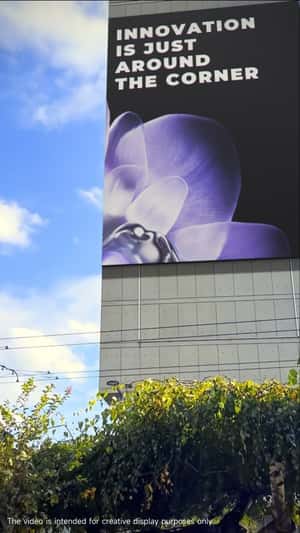 Phone Flips Open as it Hangs in fake-out-of-home ad of Xiaomi