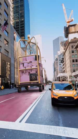 Trolley Package Delivery in fake-out-of-home ad of Victoria’s Secret