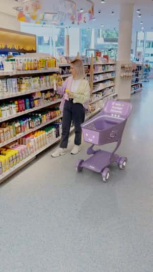 Futuristic Shopping Cart in a fake-out-of-home ad of DM