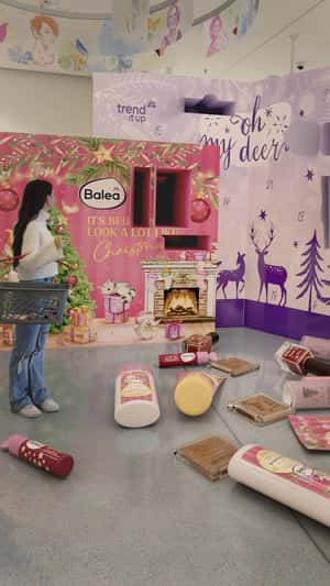 Wall Installation Boxes Drops Products in a fake-out-of-home ad of DM