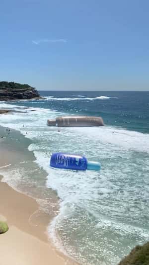 Inflated Products Float at Beach in a fake-out-of-home ad of Sephora