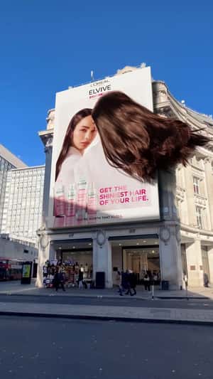 Elvive billboard in London fake-out-of-home ad of L'Oréal Paris