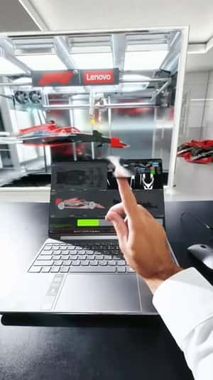 Laptop Makes F1 Car at Home   in fake-out-of-home ad of Lenovo