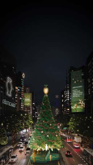 Christmas Tree Lights Up in a fake-out-of-home ad of O Boticário