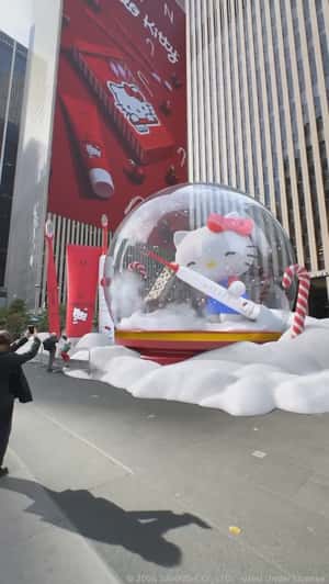 Hello Kitty Brushing The Snow Globe in fake-out-of-home ad of MOON