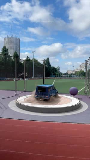 Oversized hammer throw fake out of home ad of Mercedes-Benz