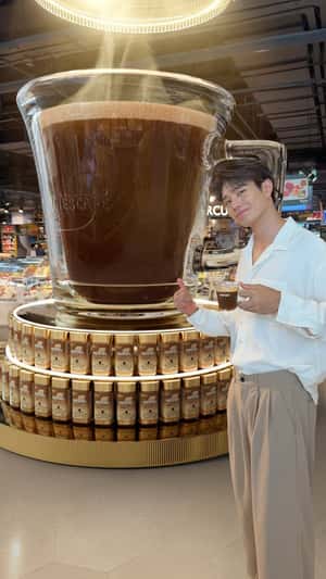 Coffee-Filled Clear Cup in fake-out-of-home ad of Nescafé