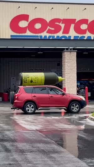 Oversized Oil Bottle in fake-out-of-home ad of Graza