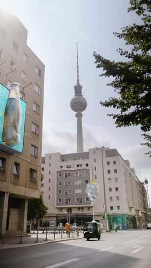 3D Bottle Pours Drink to Glass in fake-out-of-home ad of Schweppes