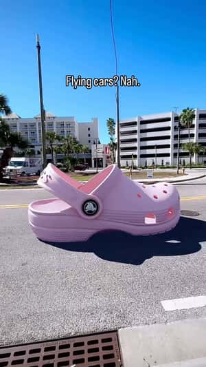 Sandals Like Flying Cars in a fake-out-of-home ad of Crocs